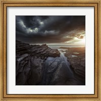 Framed Huge rocks on the shore of a sea against stormy clouds, Sardinia, Italy