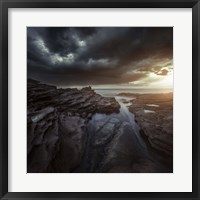 Framed Huge rocks on the shore of a sea against stormy clouds, Sardinia, Italy