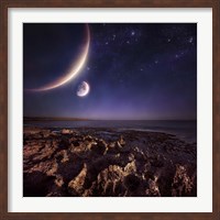 Framed Rising plantes hover over ocean and rocky shore against starry sky