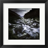 Framed Small river flowing over large stones in the mountains of Pirin National Park, Bulgaria