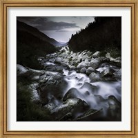 Framed Small river flowing over large stones in the mountains of Pirin National Park, Bulgaria