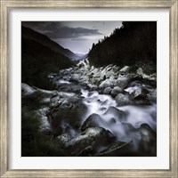 Framed Small river flowing over large stones in the mountains of Pirin National Park, Bulgaria