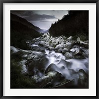 Framed Small river flowing over large stones in the mountains of Pirin National Park, Bulgaria