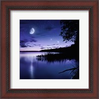 Framed Tranquil lake against starry sky, moon and falling meteorites, Russia