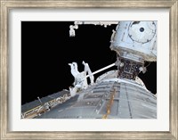 Framed STS-124 Mission Specialist, Participates in the Mission's First Scheduled Maintenance Session