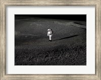 Framed Space Suit engineer simulates work inside a crater in Johnson Space Center's Lunar Yard