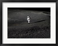 Framed Space Suit engineer simulates work inside a crater in Johnson Space Center's Lunar Yard