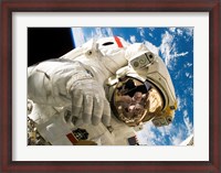 Framed Astronaut taking a spacewalk