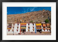 Framed Hemis Monastery facade with craggy cliff, Ladakh, India