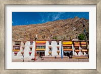 Framed Hemis Monastery facade with craggy cliff, Ladakh, India