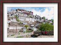 Framed Monks standing in front of the Thiksey Monastery, Leh, Ledakh, India