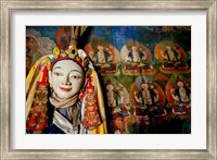 Framed Religious statue infront of Buddha mural at Shey Palace, Ladakh, India