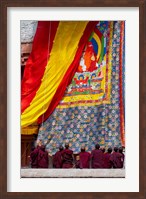 Framed Monks raising a thangka during the Hemis Festival, Ledakh, India
