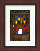 Framed Brightly colored glass window, City Palace, Udaipur, Rajasthan, India.