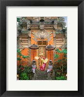 Framed Balinese Dancer Wearing Traditional Garb Near Palace Doors in Ubud, Bali, Indonesia