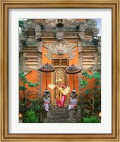 Framed Balinese Dancer Wearing Traditional Garb Near Palace Doors in Ubud, Bali, Indonesia