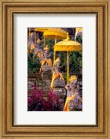 Framed Statues at Mother Temple Adorned in Yellow, Indonesia