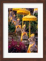 Framed Statues at Mother Temple Adorned in Yellow, Indonesia