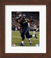 Framed Earl Thomas 2014 with the ball