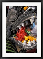 Framed Flower Offerings in Stone Dragon's Mouth, Laos