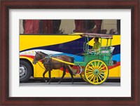 Framed Horse cart walk by colorfully painted bus, Manila, Philippines