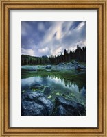 Framed Karersee Lake and Dolomite Alps in the morning, Northern Italy