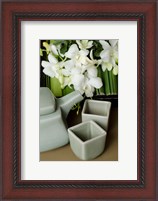 Framed Traditional Thai tea pot and cups with orchid arrangement, Bangkok, Thailand