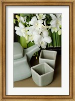 Framed Traditional Thai tea pot and cups with orchid arrangement, Bangkok, Thailand