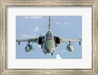 Framed Brazilian Air Force Embraer A-1B soars through the sky over Brazil