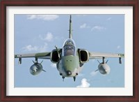 Framed Brazilian Air Force Embraer A-1B soars through the sky over Brazil