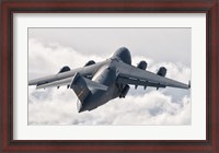 Framed C-17 Globemaster Above the Clouds