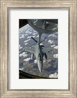 Framed Chilean Air Force F-16 refuels from a US Air Force KC-135 Stratotanker