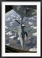 Framed Chilean Air Force F-16 refuels from a US Air Force KC-135 Stratotanker