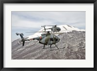 Framed Two Breda Nardi NH-500 helicopters of the Italian Air Force over Frosinone, Italy