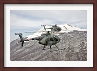 Framed Two Breda Nardi NH-500 helicopters of the Italian Air Force over Frosinone, Italy