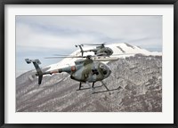 Framed Two Breda Nardi NH-500 helicopters of the Italian Air Force over Frosinone, Italy