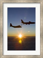 Framed MC-130H Combat Talon II Being Refueled by a KC-135R Stratotanker at Sunset