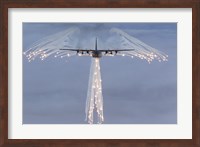Framed MC-130H Combat Talon Dropping Flares