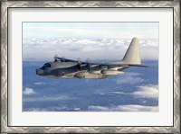 Framed MC-130P Combat Shadow Soars Above the Clouds