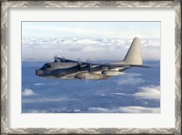 Framed MC-130P Combat Shadow Soars Above the Clouds