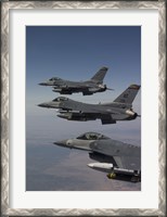 Framed Three F-16's fly in Formation over Arizona (vertical)