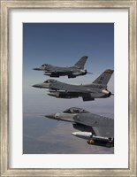 Framed Three F-16's fly in Formation over Arizona (vertical)