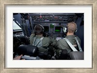 Framed Airmen at Work in a MC-130H Combat Talon II