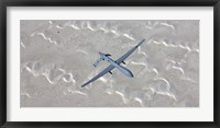 Framed MQ-1 Predator Flies over the White Sands National Monument, New Mexico