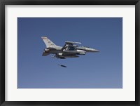 Framed F-16 Fighting Falcon Releases a GBU-38 JDAM