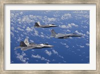 Framed F-15 Eagle and Two F-22 Raptors over Japan