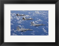 Framed F-15 Eagles and F-22 Raptors Fly in Formation