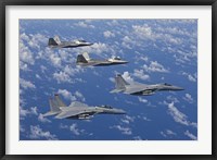 Framed F-15 Eagles and F-22 Raptors Fly in Formation
