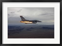 Framed F-16 Fighting Falcon Fires an AGM-65 Maverick Missile
