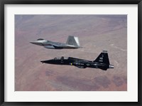 Framed F-22 Raptor and T-38 Talon Fly in Formation over New Mexico